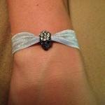 Gunmetal Rhinestone Skull E..